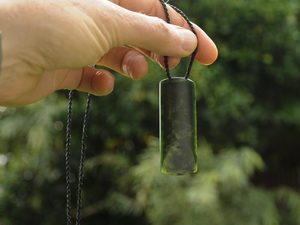 Products: Dark Pounamu Toki — A Carved Piece