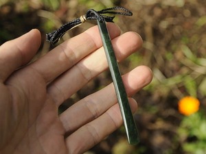 Products: Dark Pounamu Drop — A Carved Piece