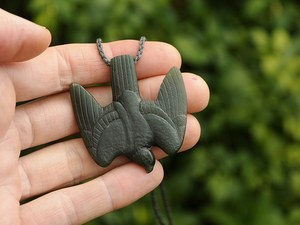 Products: Diving NZ falcon / kārearea / Morepork — A Carved Piece
