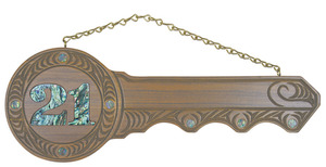 Products: Large 21st key with inlaid paua 21st Ace Engravers