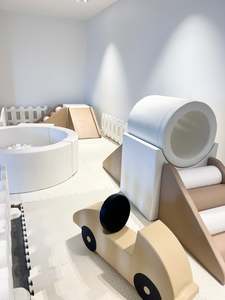 Tan and White Soft Play