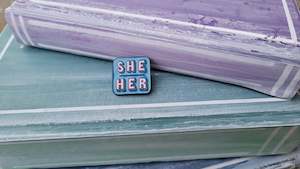 Pin: She/Her Blue