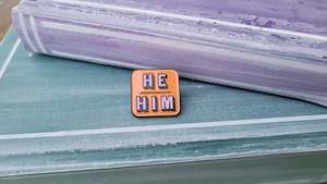 Alphabet Merch: Pin: He/Him Orange