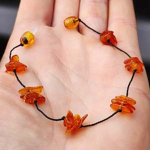 Polished Cognac Baltic Amber 3x Setting Knotted Bracelet