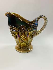 Glass And Crystal: Large rare purple iridescent carnival glass jug