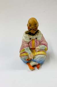 Antique ceramic bobble head oriental figurine