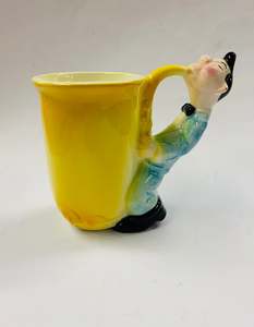 Vintage novelty saxophone player mug