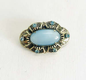 Silver Metal Brooch with Blue Oval center