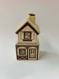 New Zealand Pottery: Rare Air New Zealand colonial collection ceramic house bottle