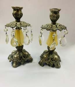 Pair of ornate antique candlesticks