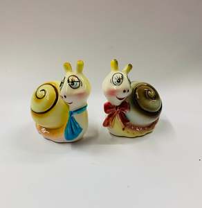 Cookware: Pair of vintage novelty snail salt and pepper shakers