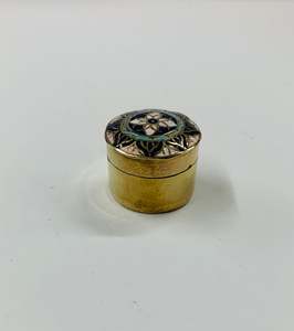 Antique brass pill box with enamel design lid