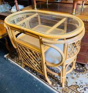 Furniture: 2 seat cane table and chairs
