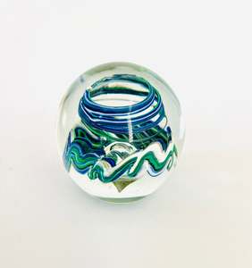 Paperweight with Blue White and Green Squiggles and Swirls around a Bubble ￼