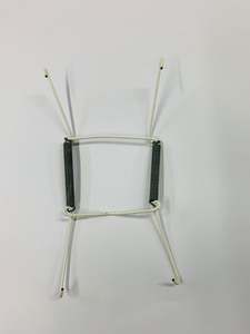 Vintage white wire and metal stretchy plate hanger