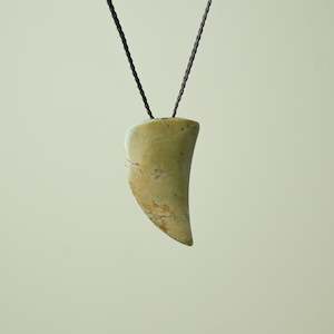 Manaakitanga Caring: Large Raukaraka Pounamu Niho Tooth Pendant