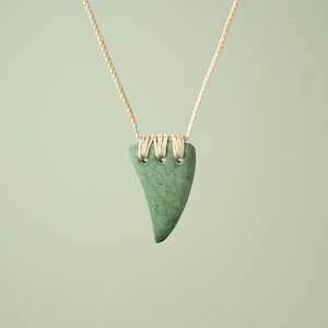 Manaakitanga Caring: Medium Inanga Pounamu Niho Tooth Pendant