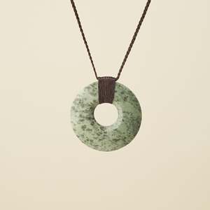 Circle Of Life: Porowhita Circle of Life Kōkopu Pounamu Large, Brown Binding