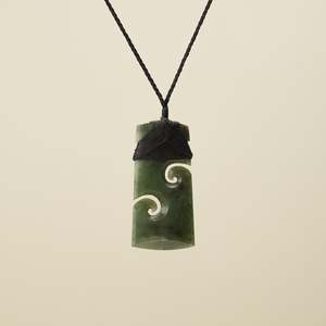Koru Pendants: Toki with Koru Raukaraka Pounamu Large, Black Binding