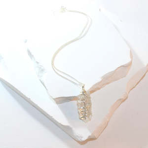 Clear quartz crystal pendant necklace on sterling silver chain