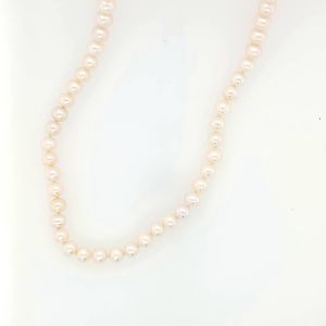 Pearls 1: Classic Semi-round White Pearl Strand