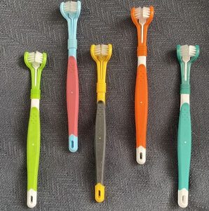 Products: Triple-headed toothbrush - The Balanced Dog