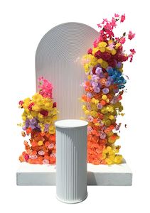 Multi coloured floral and Ripple backdrop arrangment