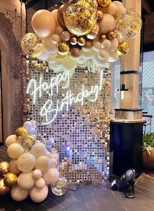 White gold shimmer wall and Happy birthday neon