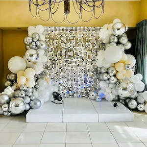 Silver Shimmer wall and a stage rental