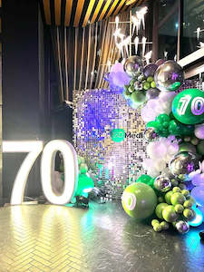 Silver shimmer wall package with logo