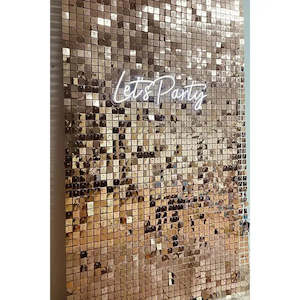 Rose gold Shimmer wall hire with neon signage