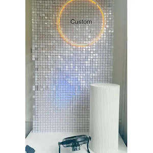 Backdrop Hire: All white shimmerwall hire