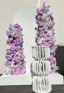 Purple Flower Arrangements and backdrop