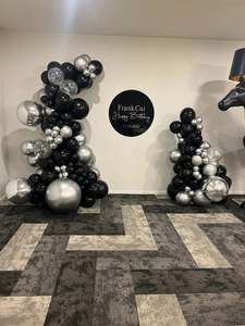 Black and silver inflated balloon garland and hire sign