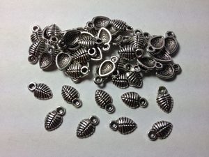 Products: 50 Silver metal leaf charms Beadzone