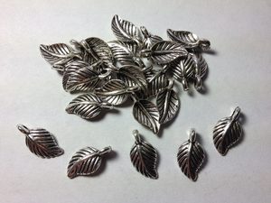 Products: 25 Silver metal leaf charms Beadzone
