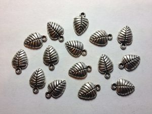 Products: 15 Silver metal leaf charms Beadzone