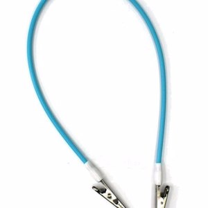 Products: Dental Bib Holder - blue, yellow or pink