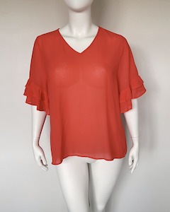 Shine On Gloss By Shine On: Gloss by Shine On orange top