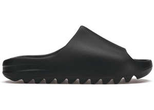 Adidas Yeezy Slide Onyx Foam Sandal With Soft Footbed And Grooved Outsole For Stability