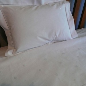 Products: White Spot Cot Pillowcase