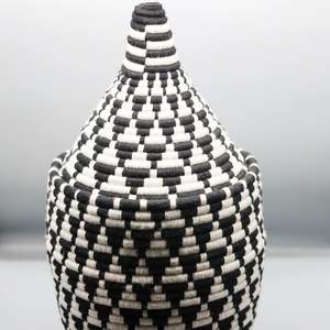 Basketry: Conical Woolen Basket