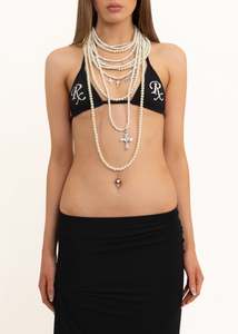 Necklaces: Multi-strand pearl necklace with cross charms