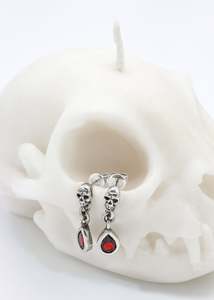 Skull garnet drop earrings