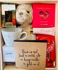 Flowers Gift Items: Comes with a hug - Care box