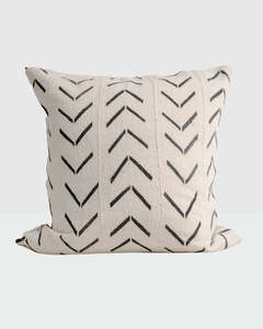Cream-colored base and black chevron-style patterns