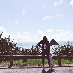 Kate admires the view wearing Bold’s Good AF / Bad AF Sequin hoodie in New Plymouth