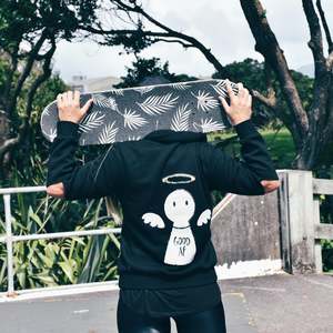 Kate wears Bold’s Good AF / Bad AF Sequin hoodie in New Plymouth, NZ