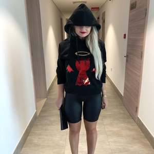 Kai wears Bold's Angel / Devil Sequin hoodie