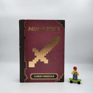 Action: Minecraft: The Combat Handbook- Mojang